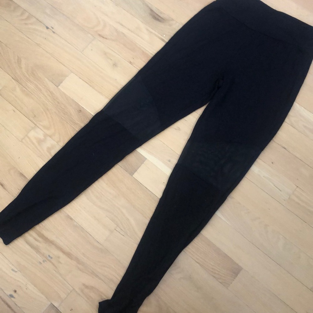 Never worn black leggings with mesh detail